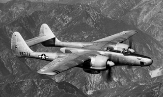 The Northrop F-15 Reporter, the reconnaissance variant of the P-61. Note the redesigned center section, and the portholes in the nose for photography. (San Diego Air and Space Museum)